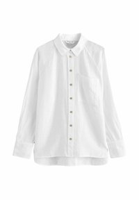 Chemise blanche en lin avec col classique, manches longues, une poche poitrine unique et des boutons ronds couleur tan.