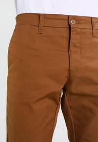 Carhartt WIP SID PANT - Calças - hamilton brown rinsed