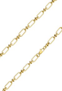 Guldtonet metal kæde med forlængede ovale led og runde forbindelser; har en sikker lobsterlås; glat overflade og skinnende finish.