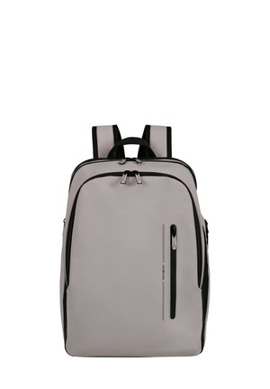 Gray backpack with black accents, featuring two shoulder straps, a front zip pocket, and a sleek, rectangular design. Smooth fabric texture.