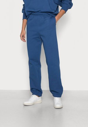 ELIANA TROUSERS - Tracksuit bottoms - navy peony