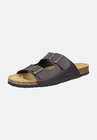 Sandales mules en cuir brun avec deux boucles réglables, semelle en liège et semelle en caoutchouc. Design à bout ouvert, forme minimaliste et texture robuste.