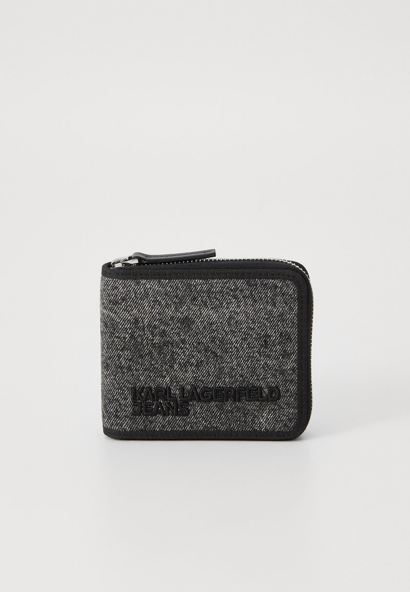Black and grey zippered wallet in a textured fabric, featuring embossed brand logo, rectangular shape, and visible zipper detail.