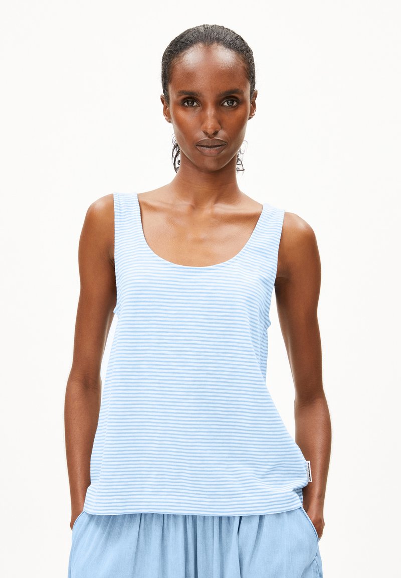 Light blue striped tank top made of soft fabric, featuring a round neckline and wide straps, paired with a light blue skirt.