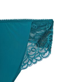 Teal bikini bund med en glat stof og en blondekant, der fremviser et blomstermønster og scalloped kanter.