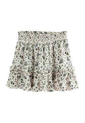 Jupe à motif floral en crème et noir, dotée d'une taille smockée, d'un ourlet volanté et d'un tissu léger et texturé.