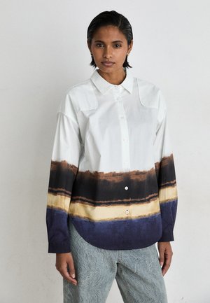 Button-up shirt in white, featuring horizontal watercolor stripes in brown, gold, and blue. Long sleeves with cuffs and a classic collar.