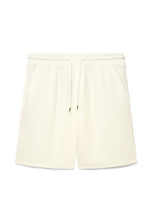 Pantaloncini in tessuto di colore bianco sporco con texture, dotati di cintura elastica, coulisse e tasche laterali, distesi su uno sfondo bianco.