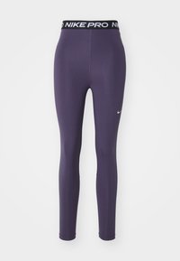 Leggings Nike Pro en púrpura oscuro, hechos de material elástico. Presentan una cinturilla negra con el texto "NIKE PRO" y un pequeño logo blanco.