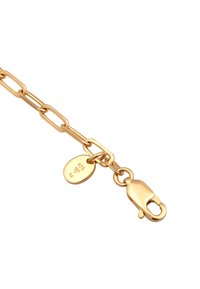 Gold-plated chain bracelet with oval links, featuring a lobster clasp and an engraved tag displaying "925" and a logo detail.