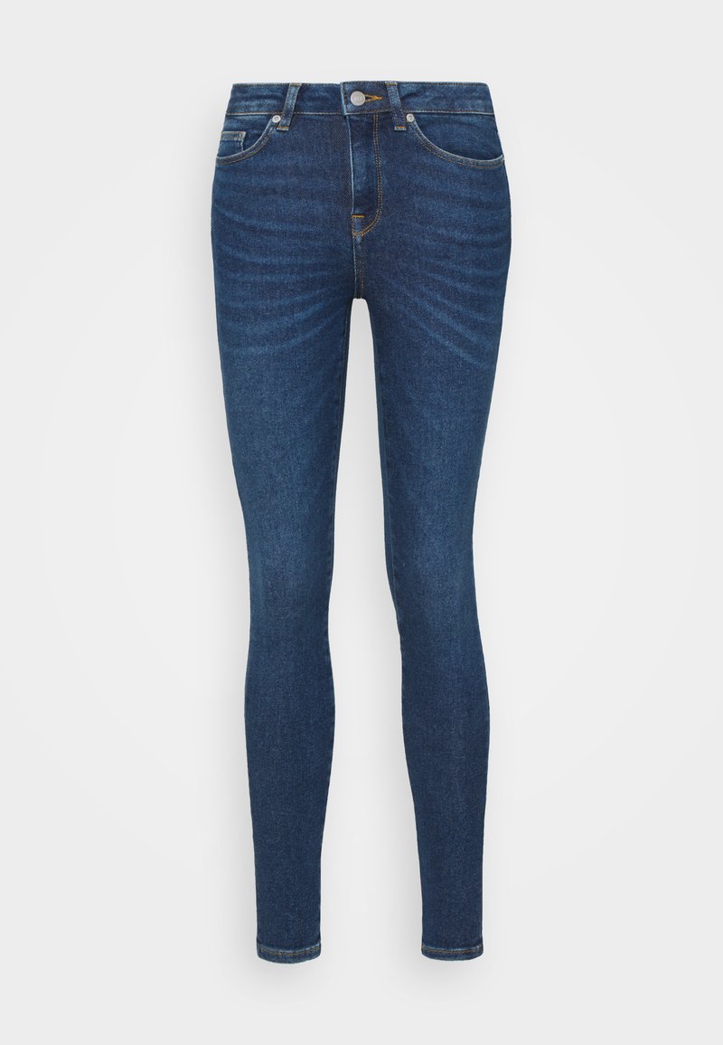 Tynne jeans i mørkeblå denim med lys fading, fem-lomme design, glidelås og metallknapp. Ren ferdig kant.