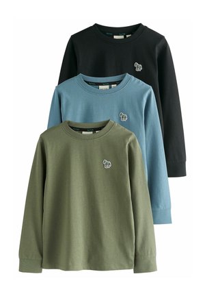 Trois chemises à manches longues en noir, bleu clair et vert olive, avec un petit logo d'éléphant brodé sur la poitrine. Matière douce en coton.