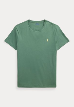 Grünes T-Shirt mit Rundhalsausschnitt und kurzen Ärmeln mit kleinem gelbem besticktem Polo Ralph Lauren-Logo auf der linken Brust.