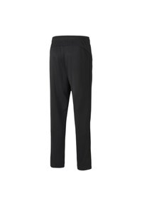 Sorte atletiske bukser lavet af letvægtsstof, med en tapered design, elastisk talje og lige ben. Ingen synlige mønstre.