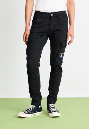 PETROL PATCH - Reisitaskuhousut - black
