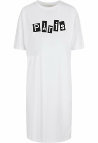 Fehér pólóruha fekete, vastag betűkkel írva, hogy "Párizs" az Eiffel-torony körvonalával. Laza fazon, rövid ujjú.