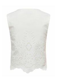 Haut blanc sans manches avec ourlet festonné et broderie anglaise florale sur le bas du dos.