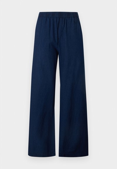 Παντελόνι σε ναυτικό μπλε με φαρδιά μπατζάκια, ελαστική μέση και επίπεδη μπροστινή όψη, κατασκευασμένο από ελαφρύ ύφασμα.