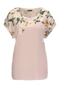 Locker sitzende Bluse mit kurzen Ärmeln in Hellrosa mit einem floralen Muster in Weiß, Gelb und Grün. Sanfte Textur mit rundem Ausschnitt.