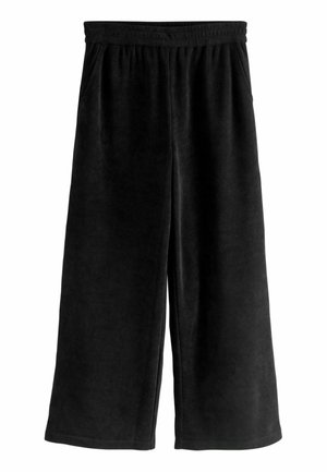 Pantaloni a gamba larga in velluto a coste neri con cintura elastica e tasche laterali. Tessuto morbido con motivo a righe verticali, senza chiusure visibili.