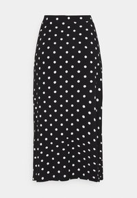 Jupe midi noire à pois en tissu doux, dotée de pois blancs disposés régulièrement et d'une coupe droite avec une taille élastique.