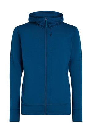 Felpa con cappuccio blu con zip integrale, tasche con zip sul davanti e sul petto, maniche lunghe con foro per il pollice e vestibilità rilassata.