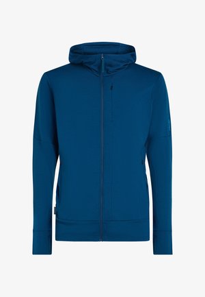 Felpa con cappuccio blu con zip integrale, tasche con zip sul davanti e sul petto, maniche lunghe con foro per il pollice e vestibilità rilassata.