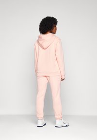 Björn Borg ESSENTIAL PANTS - Treniņtērpa apakšdaļas - apricot blush