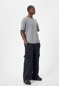 Koton OVERSIZE - Cargobukser - black