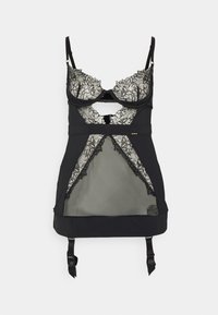 Lingerie preta com rede transparente e detalhes de renda floral. Apresenta alças e ligas ajustáveis. O design recortado destaca a cintura.