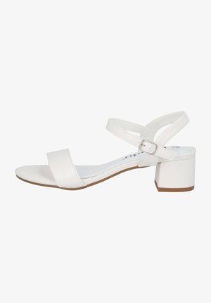 White heeled sandal with a smooth, faux leather upper, two wide straps, ankle buckle, and a block heel. Flat sole with a light brown accent.