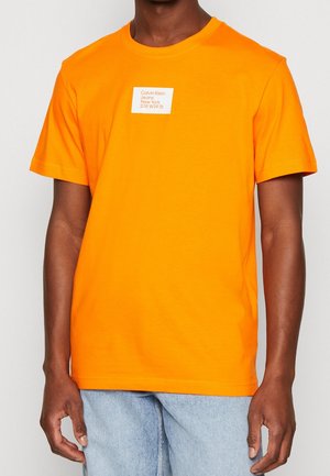 T-shirt print - orange