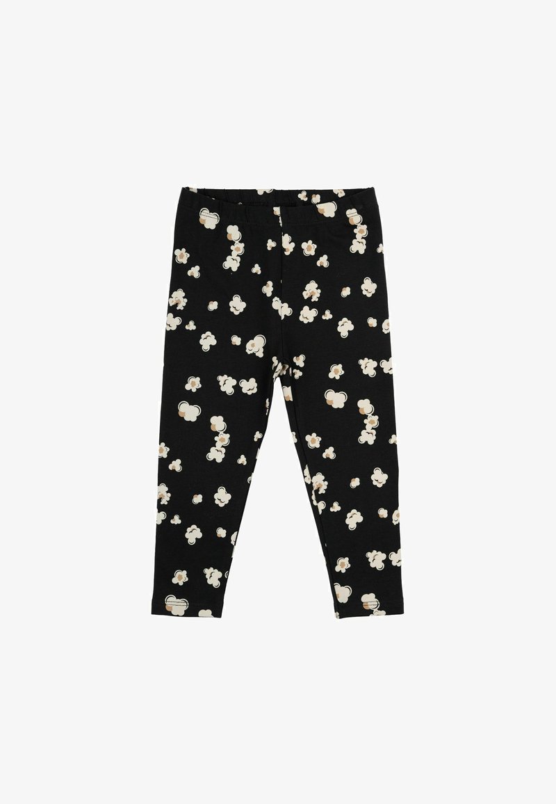 Leggings negre cu un model de popcorn în crem și maro, având un elastic în talie și un material moale pentru confort și flexibilitate.