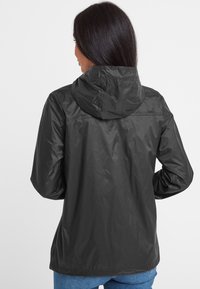 TOG24 CRAVEN - Waterproof jacket - black
