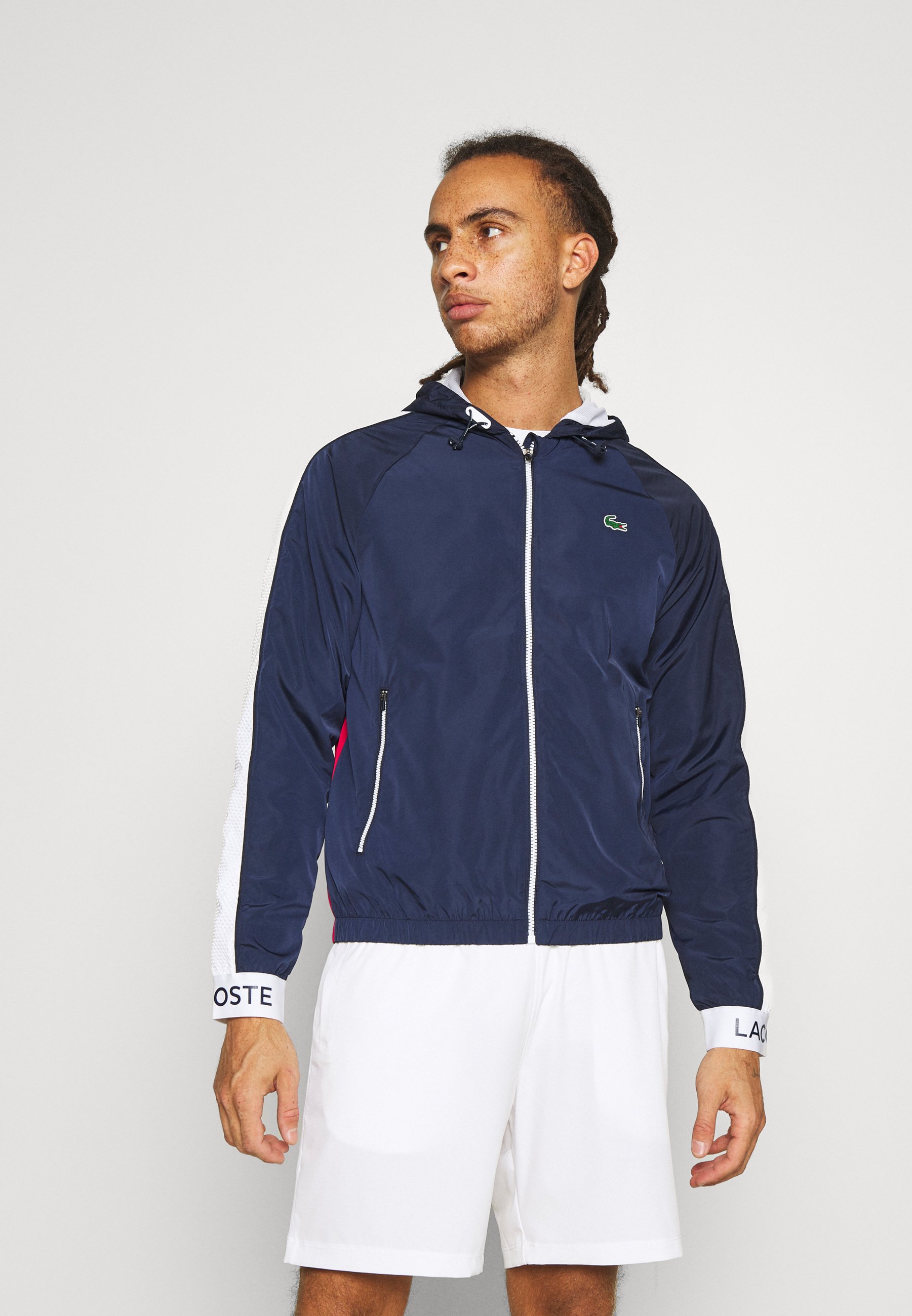 white and navy jacket