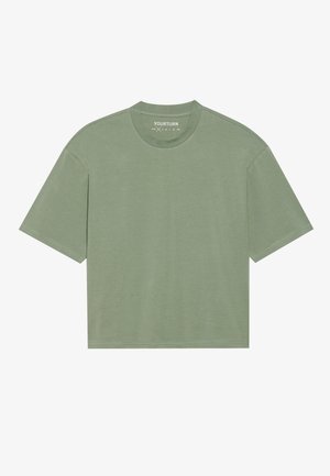 T-shirt vert clair à manches courtes en tissu doux. Doté d'un col rond et d'une coupe décontractée, avec des coutures visibles le long des bords.