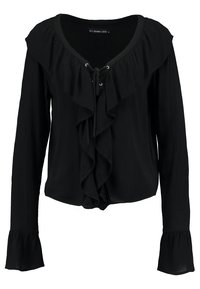 Blouse noire à manches longues avec un col volanté, un laçage à l'avant orné d'accents métalliques, et des poignets évasés. Tissu texturé et léger.