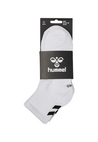 Vita ankelsockor i ett paket om sex, tillverkade av en bomullsblandning. Har svart logotyp och storleksmarkeringar. Slät textur med förstärkt häl.