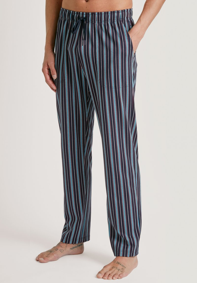 Marineblauwe gestreepte pyjamabroek met een drawstring taille, met witte en lichtblauwe verticale strepen en zijzakken.