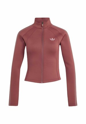 Veste ajustée mauve zippée intégralement, manches longues, col montant, détails rayés sur les bras et petit logo Adidas sur la poitrine gauche.