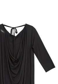 Czarny top z długim rękawem, z głębokim drapowanym dekoltem z tyłu i zapięciem na węzeł na karku.