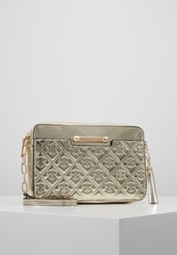 River Island Bandolera - gold-coloured