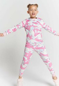 Pink pajama set with long sleeves and leggings, featuring cartoon bunnies and flowers. Soft fabric with contrasting cuffs and waistband.
