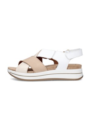 Sandalo da donna beige e bianco con sottopiede imbottito, cinturini regolabili in velcro e suola bianca sportiva con battistrada marrone chiaro.