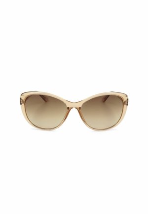 Occhiali da sole cat-eye con montatura beige traslucida e lenti marroni sfumate su sfondo bianco.