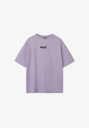 Lavender short-sleeve t-shirt in cotton fabric featuring a small black and white Mickey Mouse graphic above the word "MICKEY." Rounded neckline.