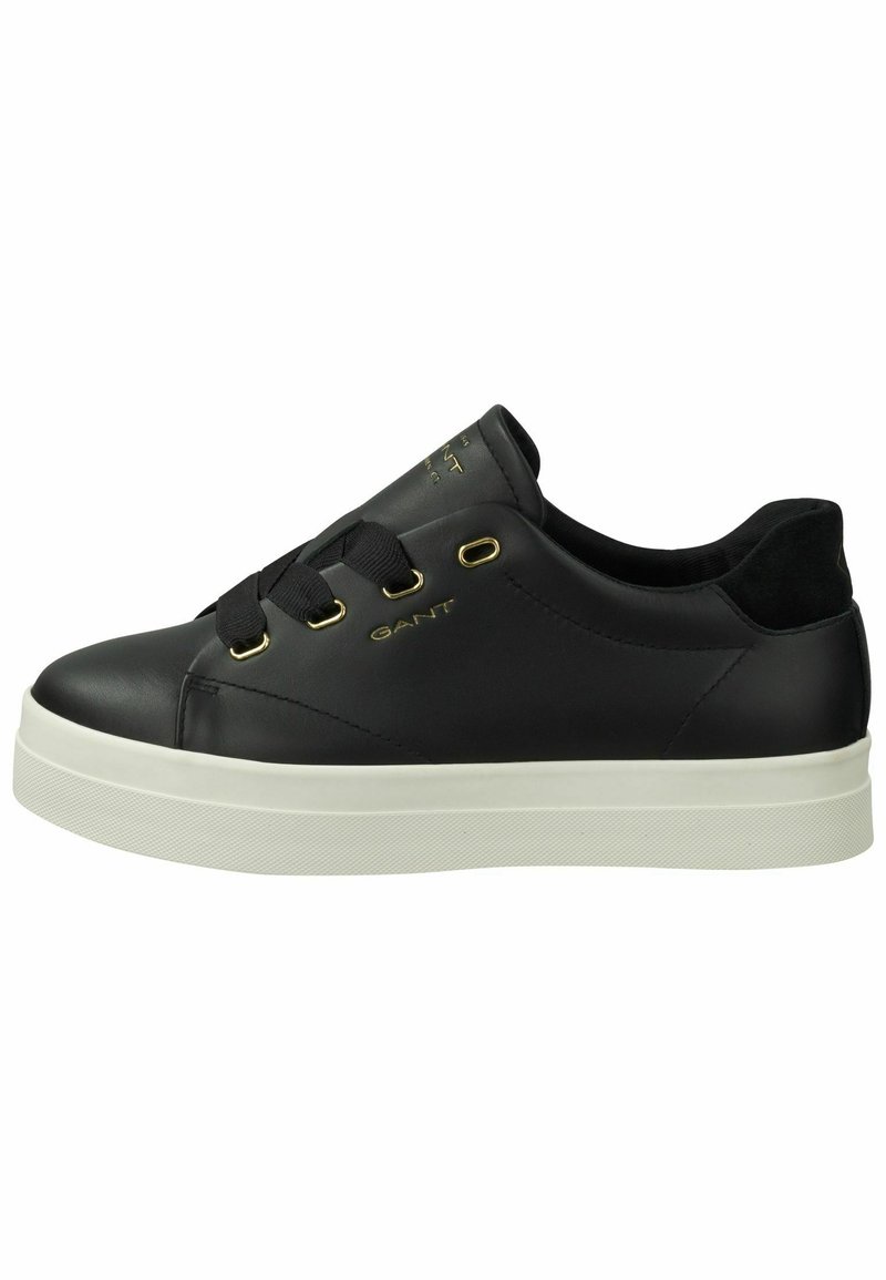 Black leather sneaker with round toe, flat white rubber sole, gold eyelets, and black laces. Features GANT logo on the side.
