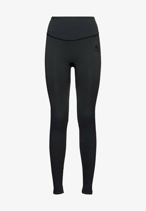 Zwarte legging van rekbaar materiaal, met een hoge taille, een gladde textuur en subtiele branding aan de linkerkant.