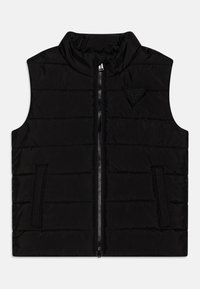 Chaleco acolchado negro con cuello alto, cremallera frontal y parche con logo. Presenta un diseño acolchado y bolsillos laterales. Textura suave y forma ajustada.