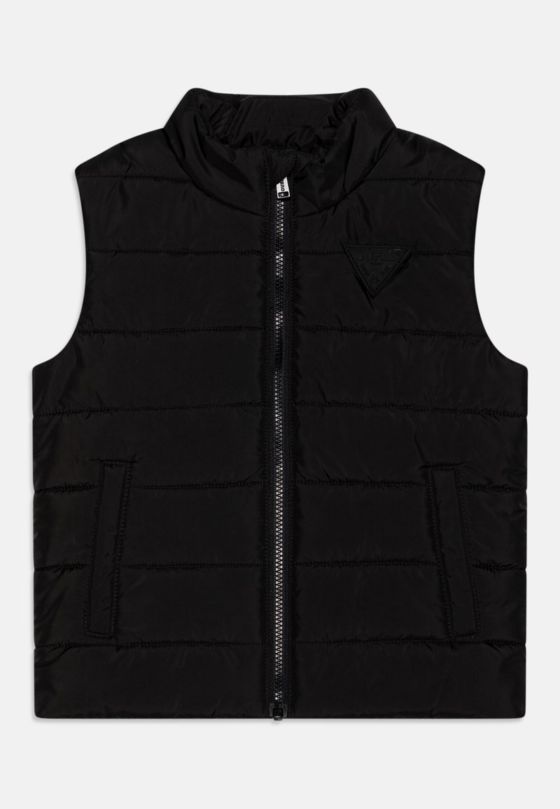 Chaleco acolchado negro con cuello alto, cremallera frontal y parche con logo. Presenta un diseño acolchado y bolsillos laterales. Textura suave y forma ajustada.